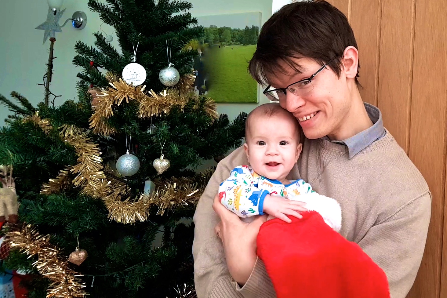 Adam and his daughter at Christmas