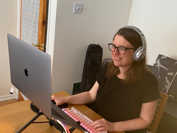 Rachael on her laptop working from home