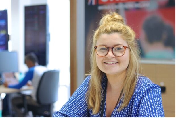 Elle smiling in the office