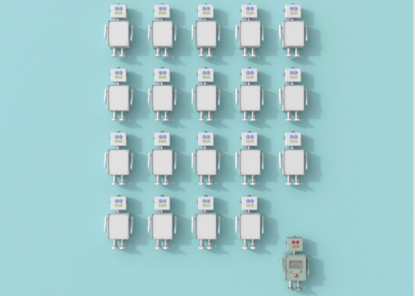 A group of toy robots on a light blue background